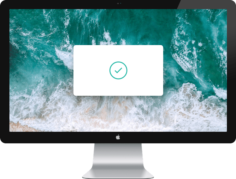 Image of Apple Display with ocean background and white box with green circled checkmark